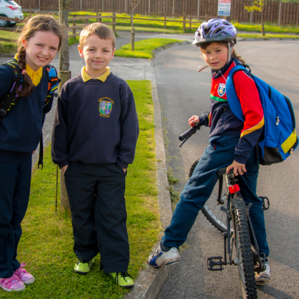 Children on bike on the way to school