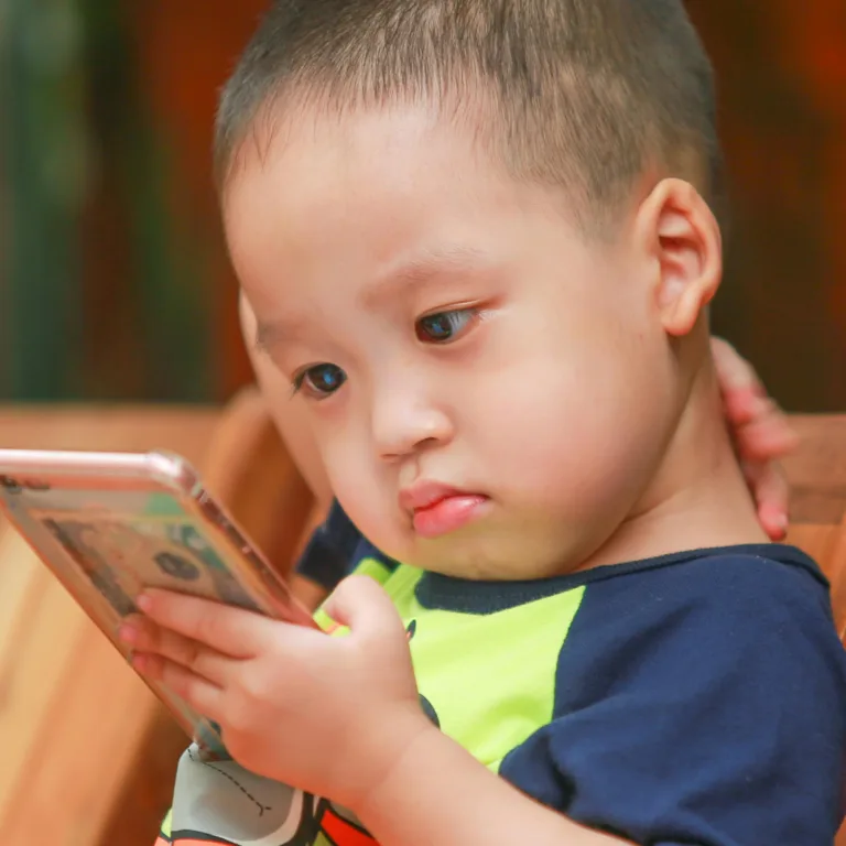 Power of Zero child with phone